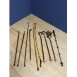 Quantity of walking sticks/canes/shooting sticks, including modern HT metal anti shock adjustable