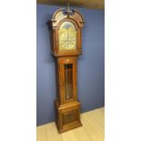 A Mid C19th American mahogany Tall Case Clock with Arched silvered dial and 2 subsidiary dials and a