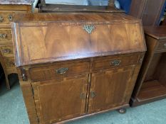 Small Late C18th/early 19th cross and feather banded yew wood veneer on oak bureau, with fitted