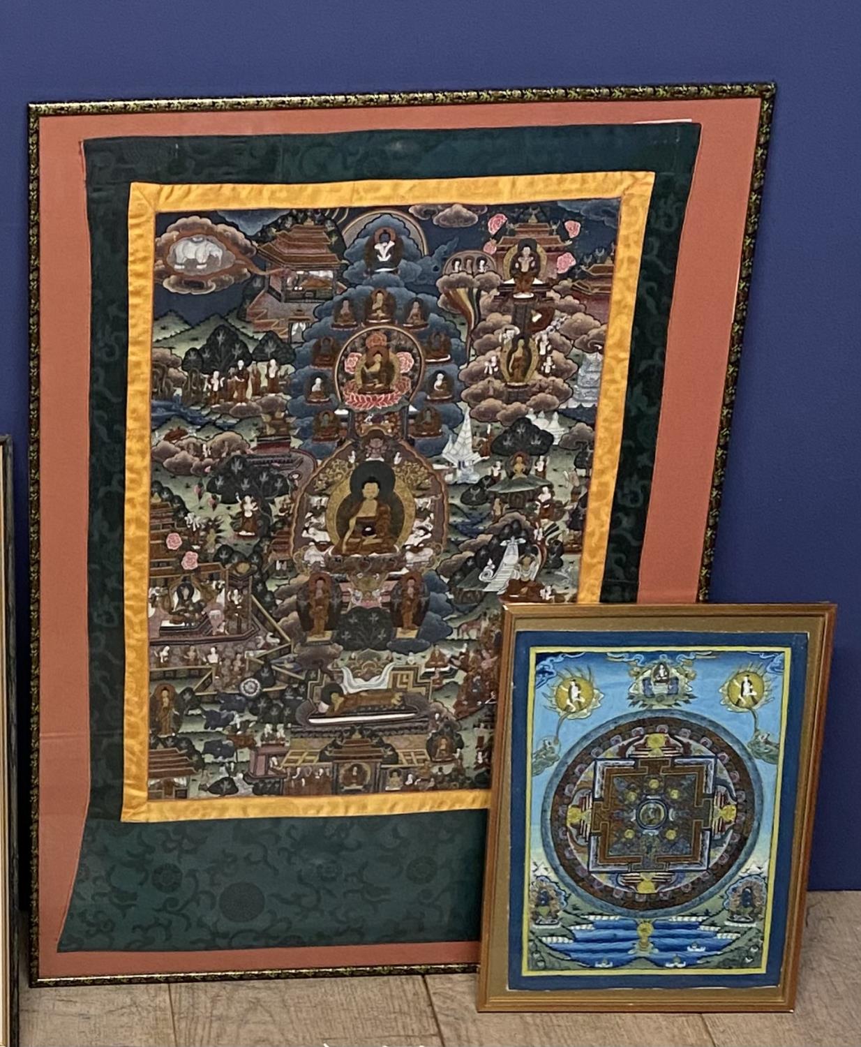 Two C20th Tibetan Thankgas, the larger overall including frame 83 x 62 cm