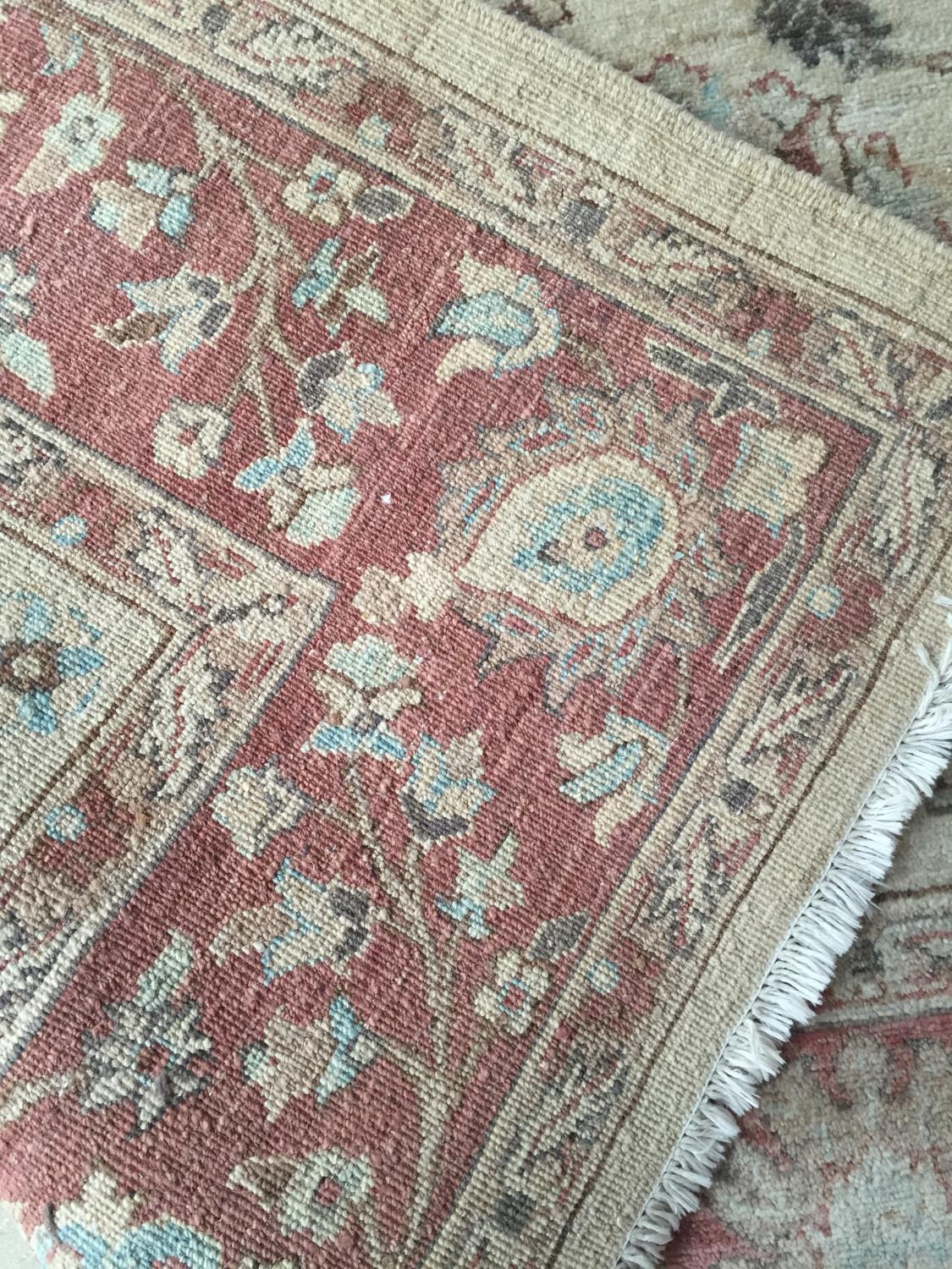 A Paskistani 100% hand knotted woollen oriental carpet, with soft fawn ground with pinks, 189 x - Image 2 of 4