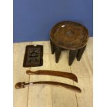 Carved tribal African wooden stool , 2 carved wooden ceremonial swords, and an antique carved