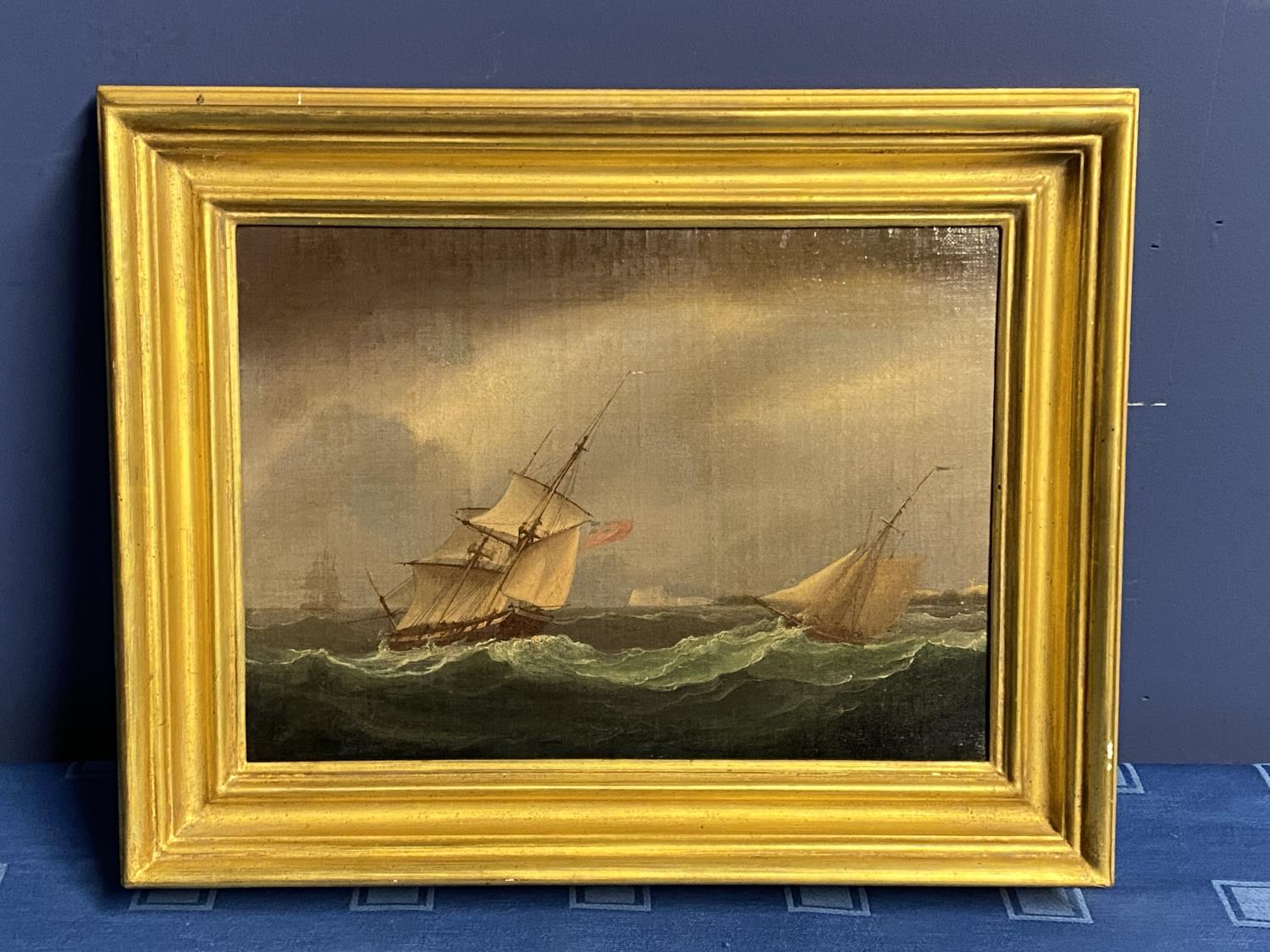 C19th, oil on canvas, 2 sailing ships in a stormy sea, windmill in distance, indistinctly signed