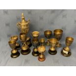 7 hallmarked silver small trophy cups one with cricket bat pedestal 9.4 ozt and 5 plated ones (12)