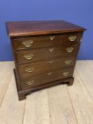 Small George lll mahogany chest of 4 graduated drawers supported on bracket feet