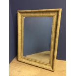 Rectangular bevelled wall mirror, set within a cream/washed decorative frame88cm H x68cmW overall