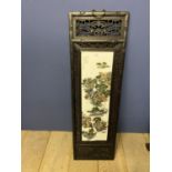 Chinese ceramic screen decorated with landscapes mounted in fretwork wooded frame. (condition