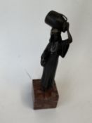 Cold painted bronze North African robed lady, carrying a vessel on her head, 19cmH, (condition,