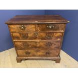 C18th cross and feather banded walnut chest of 2 short and 3 long graduated drawers, 94cmL x