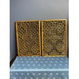 Pair of decorative mahogany oblong geometric pattern wall panels (condition, minor wear, one frame