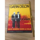 An Unframed French film poster for 1973 film with Alain Delon "Deu Hommes dans La Ville" . 50.5 cm x