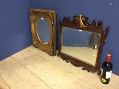 Two wall mirrors: oval mirror set in ornate gilt rectangular frame 58H x 52 W overall, and a