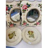 Pair of decorative oval mirrors set within a shaped rectangular frame painted with pink roses,