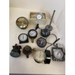 Quantity of modern and older compasses, altimeters, and vehicle gauges etc