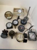 Quantity of modern and older compasses, altimeters, and vehicle gauges etc