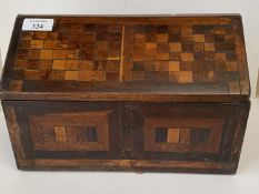 C19th Country made lidded box of mixed geometric veneers, 26 cm Long