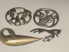 A Georg Jensen brooch, Sterling silver and a similar floral brooch., another Edinburgh 1949 as a