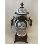 Good quality C19th French porcelain mantle clock with ormolu decoration and mask handles with