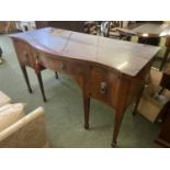 Large Georgian mahogany and inlaid serpentine front sideboard, with glass top and lion ring handles,