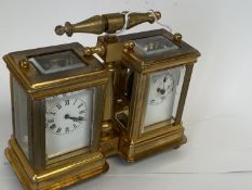 Small double brass carriage clock set one as a clock, the other as a barometer. 10.5 cm H
