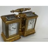 Small double brass carriage clock set one as a clock, the other as a barometer. 10.5 cm H