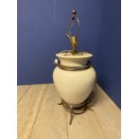 Large cream bulbous lamp on brass raised stand