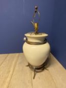 Large cream bulbous lamp on brass raised stand