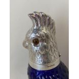 Heavy moulded blue glass claret jug with an EPNS hinged lid in the form of a Cockatoo, 25cmH