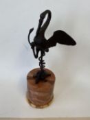 Bronze figure of a crane, standing on a turtle, on a marble base, 22.5cmH overall, (condition