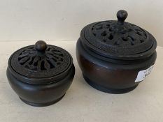 2 Chinese bronze pots with pierced lids, marks to base, 10cm D & 7.5cm (condition some wear)