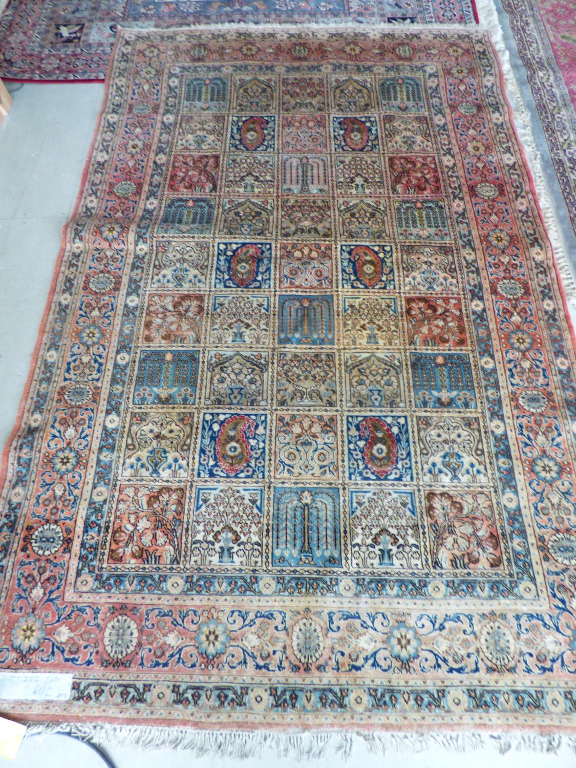 Old handmade Bokahara wool rug in muted reds & browns - condition good