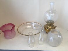 Gold coloured rimmed glass open bowl 38cm D, a brass oil lamp with etched glass and funnel, 2
