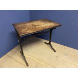 Light occasional table, with trestle style legs and worn top