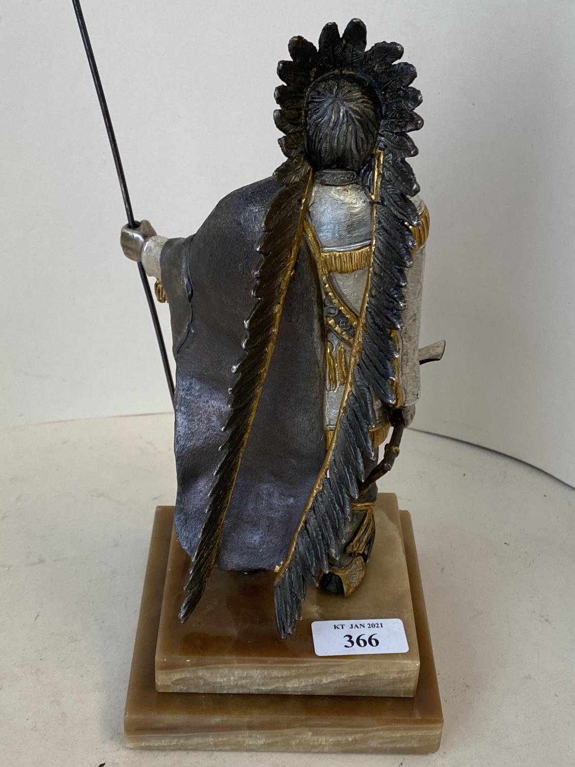 Unusual Good quality metal figure of a Red Indian warrior, intricately carved and decorated with a
