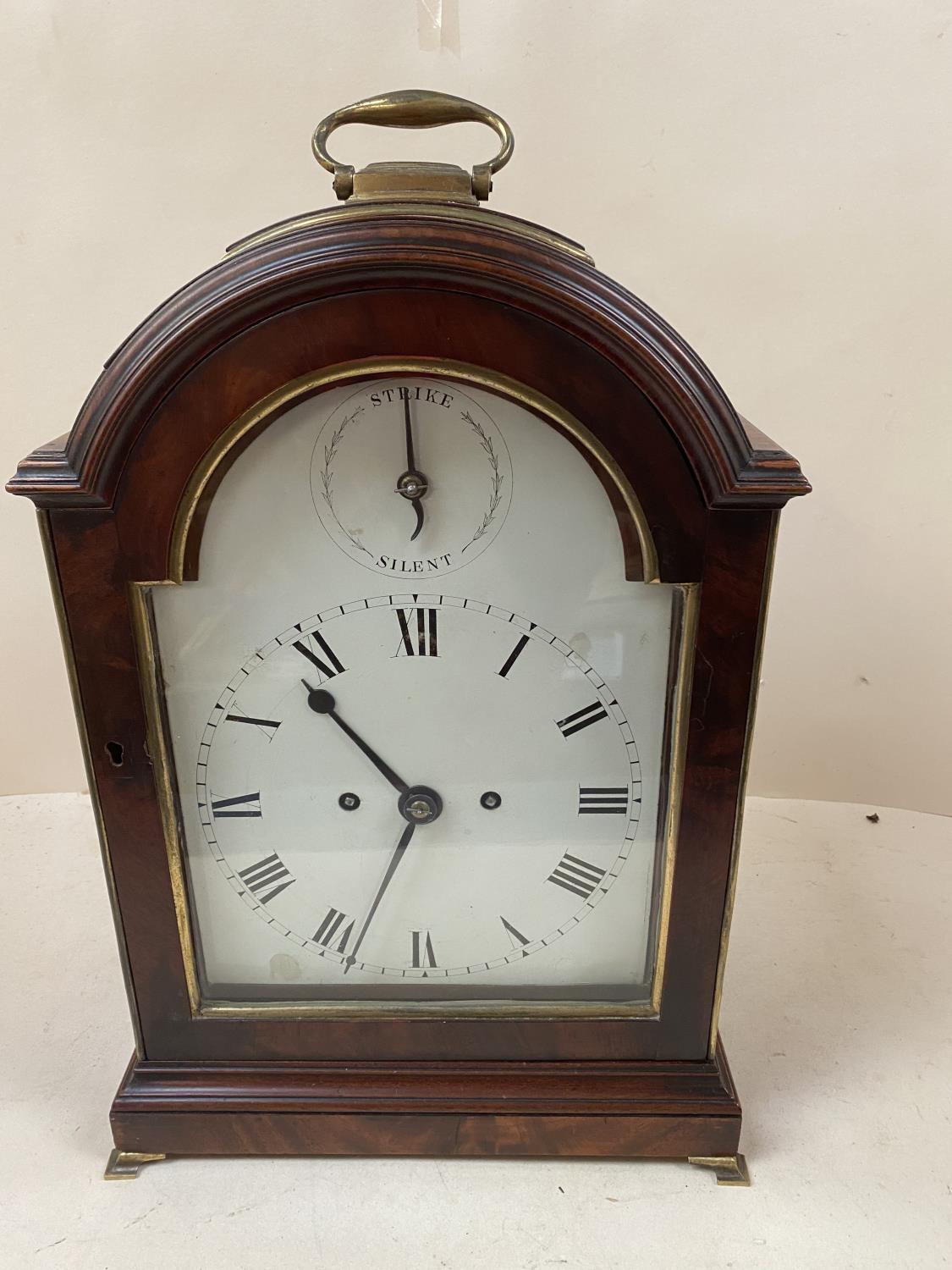 C18th Mahogany cased bracket clock, with brass top carrying handle, glazed back and front doors, and