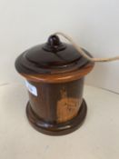 Polished lignum Vitae cylindrical string box 13cm D, (condition, chip to rim of lid and a crack to