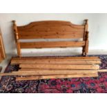 Waxed pine double bed with finial ends152cm wide approx/ 5 ft