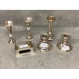 Pair of weighted squat candlesticks, damaged. Pair small weighted hallmarked silver bud vases 10.5