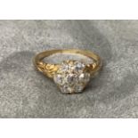 Old cut diamond cluster ring set in 18 ct yellow gold ring.