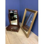 Toilet mirror, and a rectangular over mantle mirror