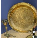 A large quantity of assorted brass and copper, to include large tray, fireplace accoutrements, etc