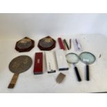 Quantity of pens, magnifier glasses etc Japanese polished bronze hand mirror with cranes and
