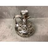 Good quality white metal embossed glass wine jug and stopper
