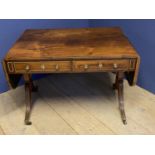 Regency rosewood sofa table with 2 drawers and opposing dummy drawers, brass decoration on brass