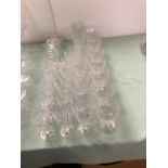 Suite of Stuart Crystal glasses, including 7 red wine, 9 white wine, 13 port glasses, 2 jam pots and