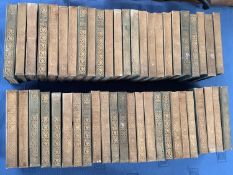 A quantity of Vintage green vellum bound books, of classical works, including Burns, Rusking etc
