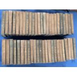 A quantity of Vintage green vellum bound books, of classical works, including Burns, Rusking etc