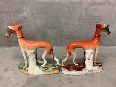 A matched pair of Staffordshire greyhounds, with hare in its mouth 15 cm H
