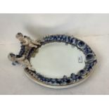 Continental porcelain framed small oval wall mirror with cherub finials, blue Sitzendorf marks (