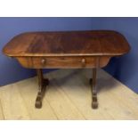 Late Regency mahogany Pembroke table with drawer and opposing dummy drawer on end supports to reeded